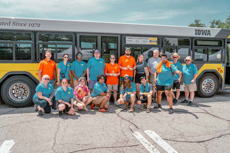 CAMBUS student employees and volunteers in front of a bus at the 2023 IPTA state roadeo