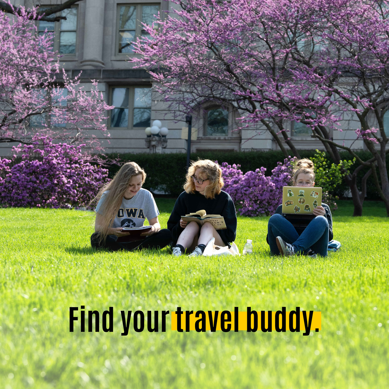 An ad for UI Rideshare showing students gathered on the Pentacrest with the caption "find your travel buddy"