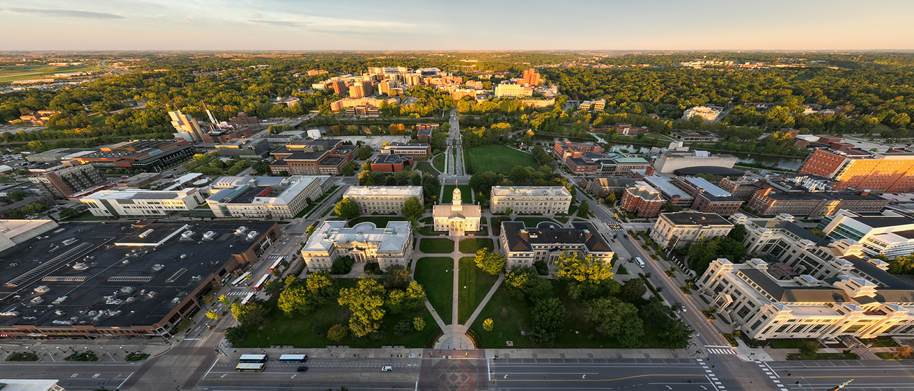 campus at sunset showing Pentacrest looking west towards health sciences campus