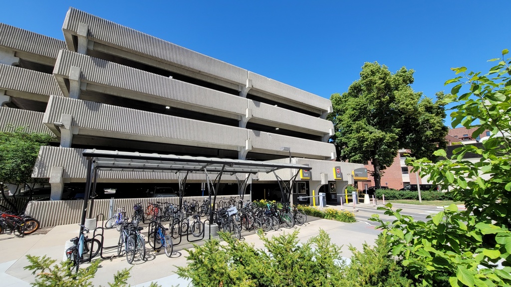 Hospital Parking Ramp 1 with bicycle parking at front on summer day