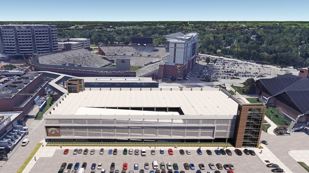 rendering of new parking ramp looking south showing tiger hawk logo on parking ramp exterior, Kinnick Stadium to the south, and UI Hospitals & Clinics to the east